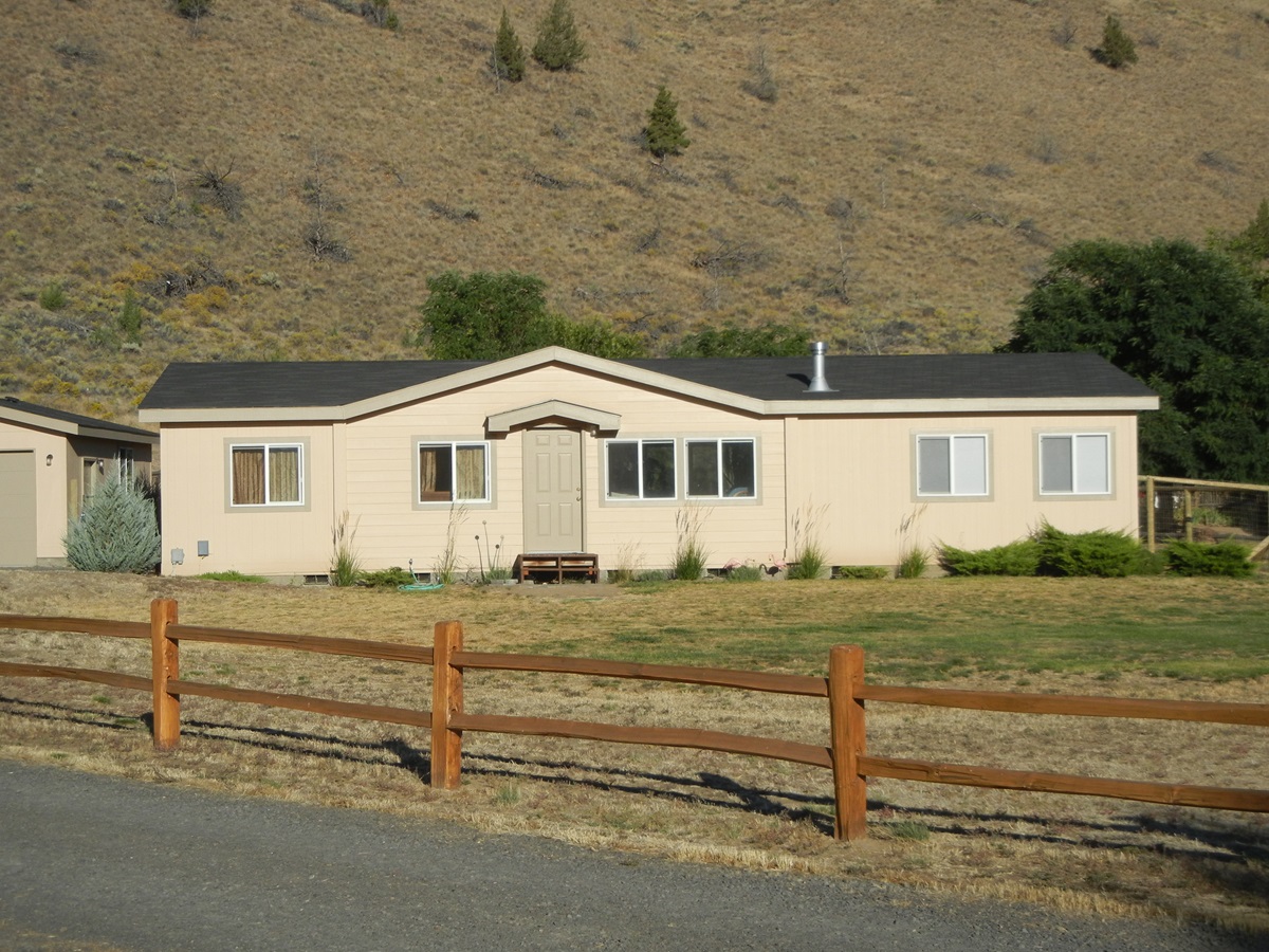 A coat of paint and a split-rail fence helped